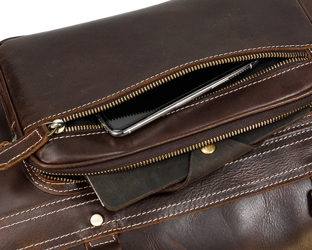 leather rolling carry on bag